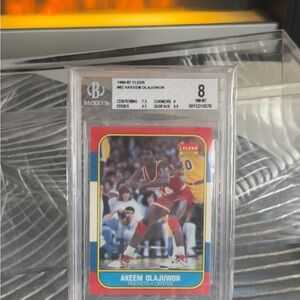 1986-87 Fleer Akeem Olajuwon Basketball Card - GRADED BECKETT 8